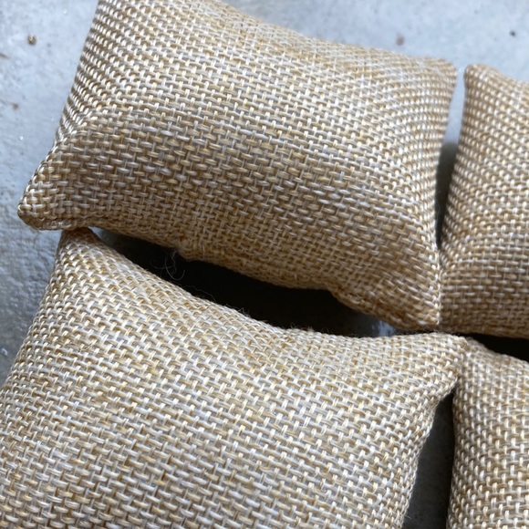 Four tan jute look miniature pillows. 3 inch by 2 inches rectangles. - Picture 2 of 6